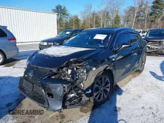 2021 Lexus UX with VIN JTHR9JBH8M2037134, listed as a IAAI auction lot 41352890 with 56,198 mi miles. Bid and sale history available at carsss.com. Image 6.