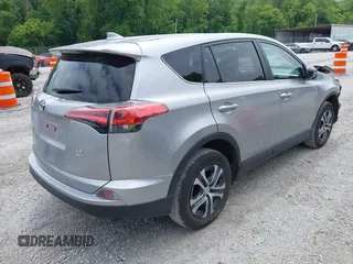 2017 Toyota RAV4 LE with VIN 2T3BFREV1HW686458, listed as a IAAI auction lot 42419676 with 24,579 mi miles and . Bid and sale history available at DreamBid. Image 4.