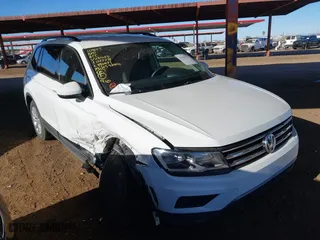 2018 Volkswagen Tiguan S with VIN 3VV1B7AX3JM091025, listed as a IAAI auction lot 41395912 with 58,840 mi miles. Bid and sale history available at carsss.com. Image 1.