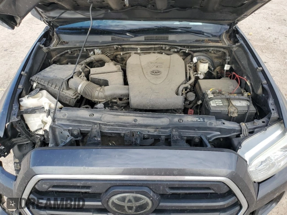 2019 Toyota Tacoma SR z VIN 3TMCZ5AN1KM191177, wystawiony jako Copart lot #56282085 z przebiegiem 110 837 mil mil oraz Szkoda całkowita • Salvage title. Historia ofert i sprzedaży dostępna na DreamBid. Obrazek 11.