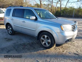 2015 Honda Pilot EX-L with VIN 5FNYF4H57FB006655, listed as a IAAI auction lot 41822385 with 125,915 mi miles and . Bid and sale history available at carsss.com. Image 1.