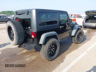 2017 Jeep Wrangler Sport with VIN 1C4AJWAG6HL654592, listed as a IAAI auction lot 42447379 with 61,585 mi miles and . Bid and sale history available at DreamBid. Image 4.