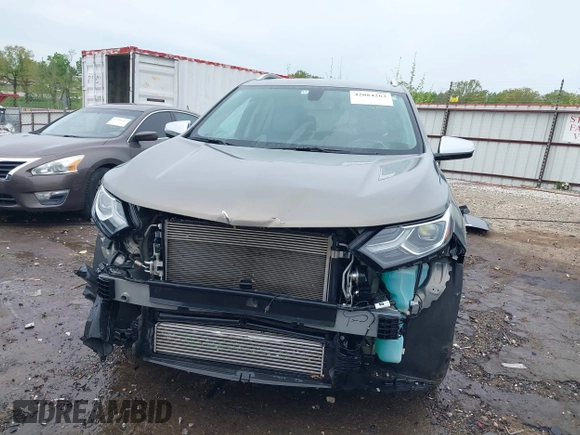 2019 Chevrolet Equinox Premier z VIN 3GNAXNEVXKS503474, wystawiony jako IAAI lot #42084263 z przebiegiem 93 838 mil mil oraz . Historia ofert i sprzedaży dostępna na DreamBid. Obrazek 13.