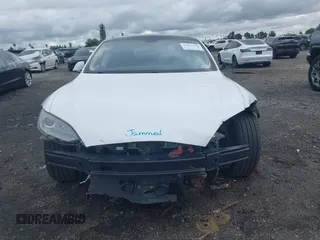 2013 Tesla Model S с VIN 5YJSA1CN0DFP31750, выставлен на аукционе IAAI как лот 41911343 с пробегом 209 664 миль миль и . История ставок и продаж доступна на DreamBid. Изображение 13.