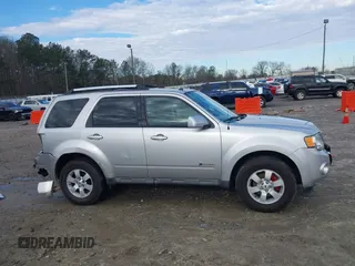 2010 Ford Escape Hybrid with VIN 1FMCU4K37AKB18225, listed as a IAAI auction lot 41271098 with 161,810 mi miles and . Bid and sale history available at DreamBid. Image 14.