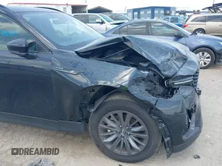 2025 Mazda CX-70 Preferred z VIN JM3KJBHD5S1117439, wystawiony jako IAAI lot #42338025 z przebiegiem 10 916 mil mil oraz . Historia ofert i sprzedaży dostępna na DreamBid. Obrazek 17.