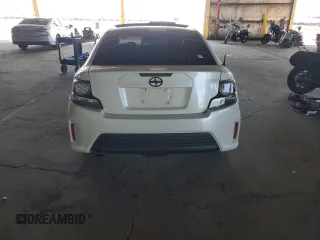 2015 Scion tC z VIN JTKJF5C70FJ003274, wystawiony jako Copart lot #53675415 z przebiegiem 83 326 mil mil oraz Szkoda całkowita • Salvage title. Historia ofert i sprzedaży dostępna na DreamBid. Obrazek 6.