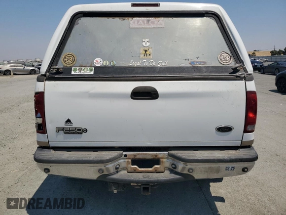 2002 Ford F-250 XL с VIN 1FTNX21F62EB72958, выставлен на аукционе Copart как лот 64620005 с пробегом 167 707 миль миль и Списание • Salvage title. История ставок и продаж доступна на DreamBid. Изображение 6.