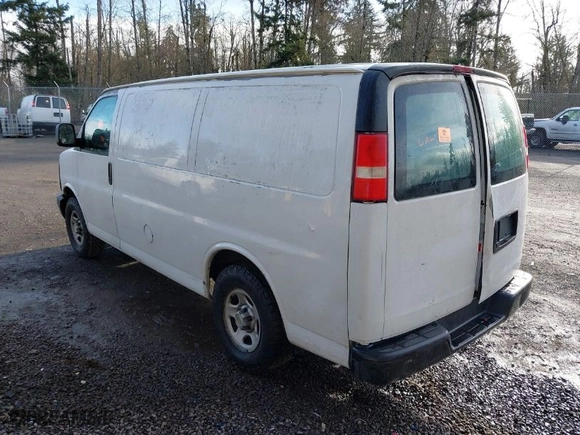 2004 Chevrolet Express Cargo Van with VIN 1GCFG15X641217294, listed as a IAAI auction lot 41796345 with 288,847 mi miles. Bid and sale history available at carsss.com. Image 3.