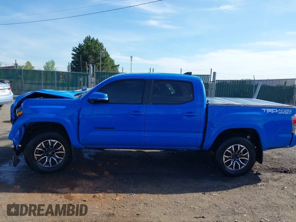 2021 Toyota Tacoma SR z VIN 3TYCZ5AN7MT008274, wystawiony jako IAAI lot #42091508 z przebiegiem 59 371 mil mil oraz . Historia ofert i sprzedaży dostępna na DreamBid. Obrazek 15.