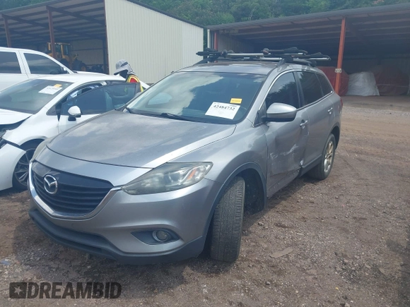 2013 Mazda CX-9 Touring with VIN JM3TB2CA7D0416096, listed as a IAAI auction lot 42484732 with 235,689 mi miles and . Bid and sale history available at DreamBid. Image 2.
