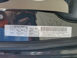 2015 Chrysler Town & Country Touring with VIN 2C4RC1BG2FR602430, listed as a Copart auction lot 49817725 with 122,958 mi miles and Salvage Title. Bid and sale history available at carsss.com. Image 13.