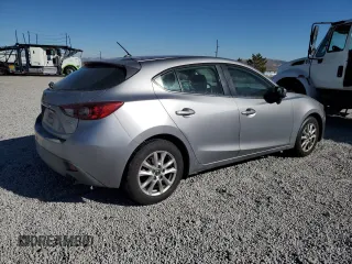 2015 Mazda 3 i Touring with VIN 3MZBM1L70FM217773, listed as a Copart auction lot 42446035 with 94,706 mi miles and Salvage Title. Bid and sale history available at carsss.com. Image 3.