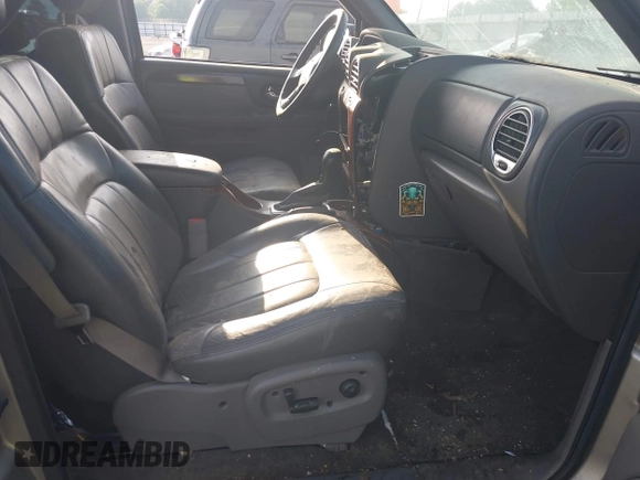 2002 GMC Envoy SLE z VIN 1GKDS13S122357410, wystawiony jako IAAI lot #42355556 z przebiegiem Nie podano mil oraz . Historia ofert i sprzedaży dostępna na DreamBid. Obrazek 5.
