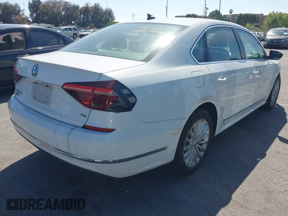 2017 Volkswagen Passat SE with VIN 1VWBT7A30HC037915, listed as a IAAI auction lot 42093170 with 98,968 mi miles and . Bid and sale history available at DreamBid. Image 4.