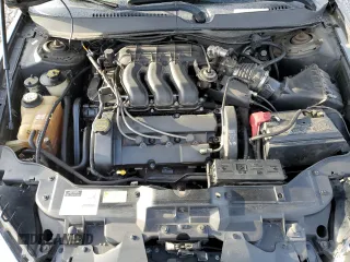 2002 Ford Taurus SE z VIN 1FAFP58S12G211216, wystawiony jako Copart lot #45158325 z przebiegiem 159 058 mil mil oraz Czysty tytuł • Clean title. Historia ofert i sprzedaży dostępna na DreamBid. Obrazek 11.