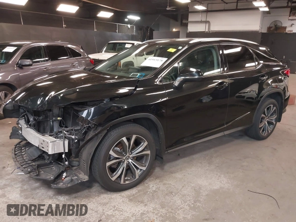 2021 Lexus RX with VIN 2T2HZMDA2MC279445, listed as a IAAI auction lot 41913178 with 38,598 mi miles. Bid and sale history available at carsss.com. Image 2.
