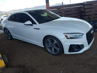 2021 Audi A5 S line Premium Plus z VIN WAUTAAF56MA029485, wystawiony jako IAAI lot #42064786 z przebiegiem 53 808 mil mil oraz . Historia ofert i sprzedaży dostępna na DreamBid. Obrazek 1.