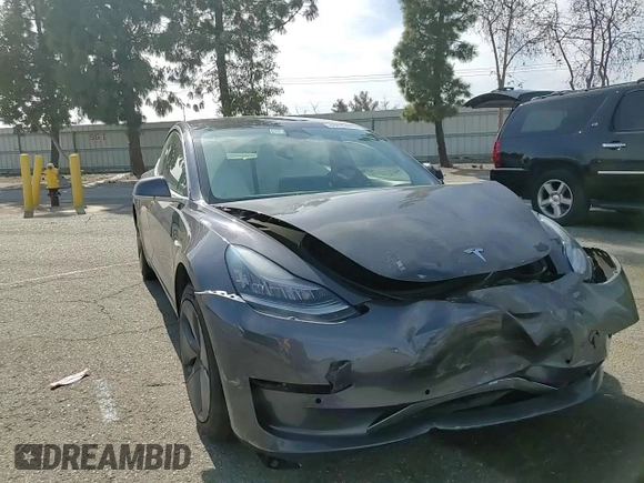 2019 Tesla Model 3 Mid Range with VIN 5YJ3E1EA0KF445185, listed as a Copart auction lot 48630675 with 76,351 mi miles and Salvage Title. Bid and sale history available at carsss.com. Image 11.