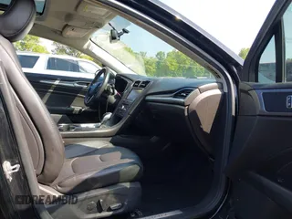 2016 Ford Fusion Titanium with VIN 3FA6P0K90GR333848, listed as a IAAI auction lot 42728138 with 147,864 mi miles and . Bid and sale history available at DreamBid. Image 5.
