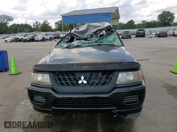 2002 Mitsubishi Montero ES z VIN JA4LS21H02J022594, wystawiony jako Copart lot #72750954 z przebiegiem 122 232 mil mil oraz Szkody całkowita. Historia ofert i sprzedaży dostępna na DreamBid. Obrazek 12.