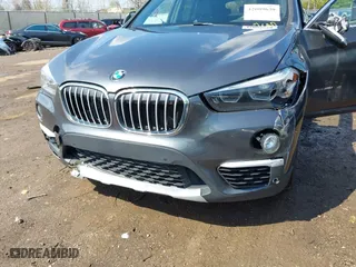 2016 BMW X1 xDrive28i with VIN WBXHT3C35GP886094, listed as a IAAI auction lot 42009639 with 61,739 mi miles. Bid and sale history available at carsss.com. Image 6.