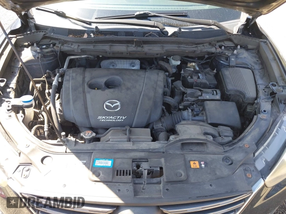2016 Mazda CX-5 Grand Touring with VIN JM3KE4DY5G0681369, listed as a IAAI auction lot 42102805 with 128,182 mi miles and . Bid and sale history available at DreamBid. Image 10.