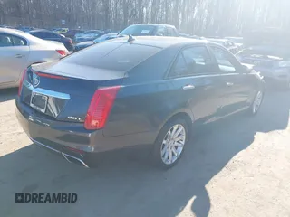 2014 Cadillac CTS Luxury RWD with VIN 1G6AR5SX0E0180611, listed as a IAAI auction lot 41366268 with 122,040 mi miles. Bid and sale history available at carsss.com. Image 4.