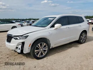2020 Cadillac XT6 FWD Premium Luxury z VIN 1GYKPCRS9LZ107178, wystawiony jako Copart lot #58789335 z przebiegiem 154 428 mil mil oraz Nie do naprawy. Historia ofert i sprzedaży dostępna na DreamBid. Obrazek 1.