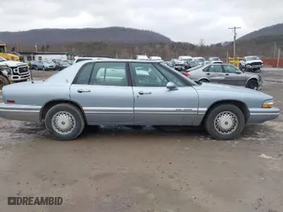 1996 Buick Park Avenue with VIN 1G4CW52K8TH609975, listed as a IAAI auction lot 41740380 with 164,919 mi miles. Bid and sale history available at carsss.com. Image 13.