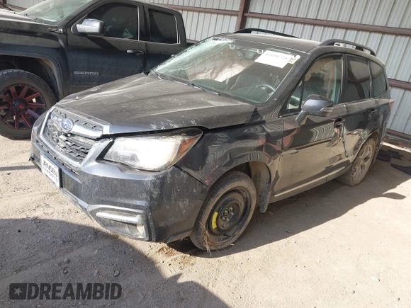 2017 Subaru Forester Touring with VIN JF2SJAWC6HH466379, listed as a IAAI auction lot 42031728 with 140,020 mi miles and . Bid and sale history available at DreamBid. Image 2.