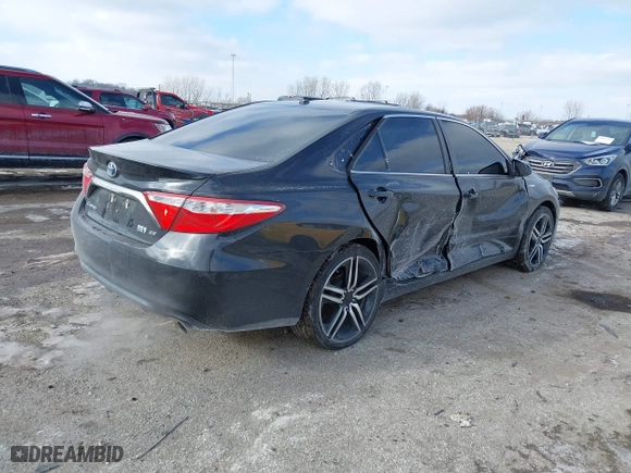 2015 Toyota Camry Hybrid LE with VIN 4T1BD1FK5FU166653, listed as a IAAI auction lot 41412963 with 105,428 mi miles. Bid and sale history available at carsss.com. Image 4.