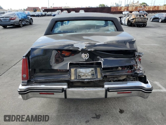 1985 Cadillac Eldorado z VIN 1G6EL578XFE640091, wystawiony jako Copart lot #71849374 z przebiegiem 30 631 mil mil oraz Szkody całkowita. Historia ofert i sprzedaży dostępna na DreamBid. Obrazek 6.