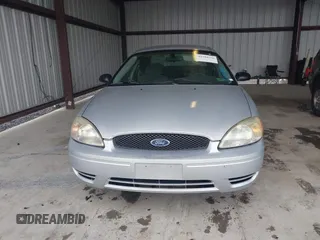 2006 Ford Taurus SE z VIN 1FAFP53U76A195301, wystawiony jako IAAI lot #42180556 z przebiegiem 180 599 mil mil oraz . Historia ofert i sprzedaży dostępna na DreamBid. Obrazek 12.