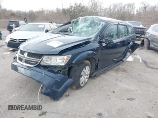 2013 Dodge Journey SE z VIN 3C4PDCAB7DT701180, wystawiony jako IAAI lot #41609700 z przebiegiem 118 207 mil mil oraz . Historia ofert i sprzedaży dostępna na DreamBid. Obrazek 2.