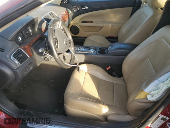 2013 Jaguar XK with VIN SAJWA4GB0DLB50530, listed as a Copart auction lot 82715724 with 24,634 mi miles and Salvage Title. Bid and sale history available at carsss.com. Image 7.