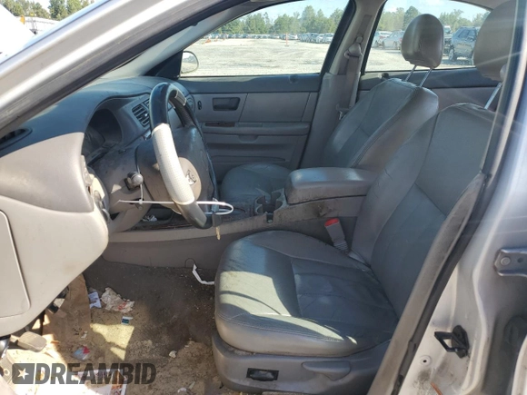 2003 Mercury Sable LS with VIN 1MEHM55S73A619013, listed as a Copart auction lot 73504154 with 200,135 mi miles and Salvage Title. Bid and sale history available at DreamBid. Image 7.