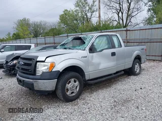 2014 Ford F-150 XL with VIN 1FTEX1EM2EFB00107, listed as a IAAI auction lot 40443721 with 121,674 mi miles and . Bid and sale history available at carsss.com. Image 2.