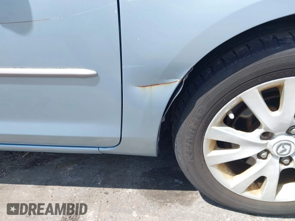 2007 Mazda 3 i Sport with VIN JM1BK32F271707045, listed as a IAAI auction lot 42166852 with 101,693 mi miles. Bid and sale history available at carsss.com. Image 6.