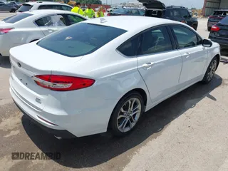 2020 Ford Fusion SEL with VIN 3FA6P0CD3LR152711, listed as a IAAI auction lot 42516763 with 97,073 mi miles and . Bid and sale history available at DreamBid. Image 4.