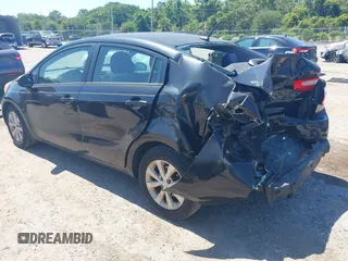 2013 Kia Rio EX with VIN KNADN4A32D6119638, listed as a IAAI auction lot 42313287 with 133,459 mi miles and . Bid and sale history available at DreamBid. Image 3.