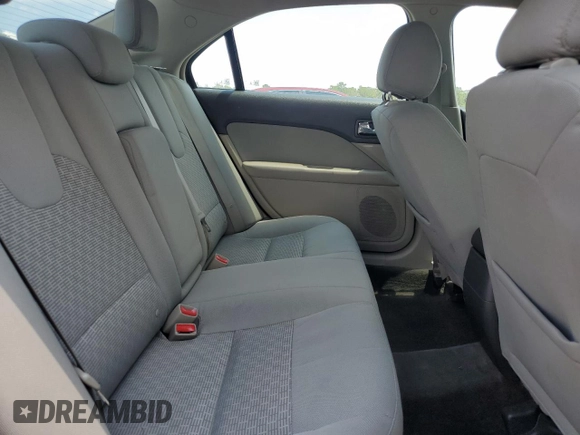 2012 Ford Fusion SE z VIN 3FAHP0HA0CR328833, wystawiony jako Copart lot #57631955 z przebiegiem 94 613 mil mil oraz Szkoda całkowita • Salvage title. Historia ofert i sprzedaży dostępna na DreamBid. Obrazek 10.