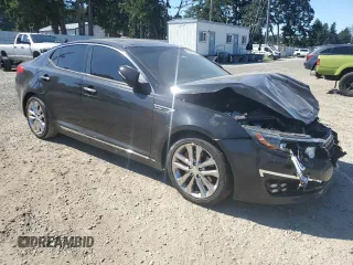 2015 Kia Optima SX Turbo with VIN 5XXGR4A63FG517153, listed as a Copart auction lot 65068985 with 153,482 mi miles and Salvage title. Bid and sale history available at DreamBid. Image 4.