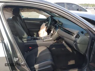 2021 Honda Civic Sport with VIN SHHFK7H44MU217741, listed as a IAAI auction lot 42029373 with 68,572 mi miles and . Bid and sale history available at DreamBid. Image 5.