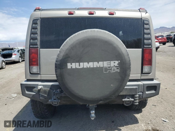 2005 Hummer H2 SUV z VIN 5GRGN23U45H118439, wystawiony jako Copart lot #54339065 z przebiegiem 382 791 mil mil oraz Szkoda całkowita • Salvage title. Historia ofert i sprzedaży dostępna na DreamBid. Obrazek 6.