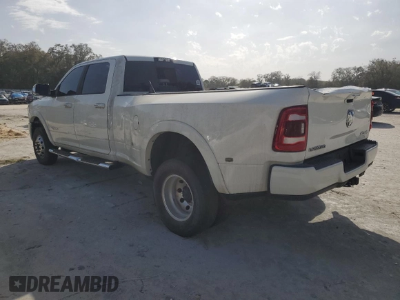 2020 Ram 3500 Laramie with VIN 3C63RRJL9LG233088, listed as a Copart auction lot 48007145 with 228,234 mi miles and Salvage Title. Bid and sale history available at carsss.com. Image 2.