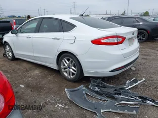2016 Ford Fusion SE with VIN 1FA6P0H70G5105051, listed as a IAAI auction lot 42002630 with 178,851 mi miles. Bid and sale history available at carsss.com. Image 3.