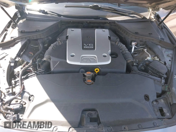 2014 Infiniti Q50 Premium with VIN JN1BV7AP5EM672766, listed as a IAAI auction lot 42107952 with 66,929 mi miles. Bid and sale history available at carsss.com. Image 10.