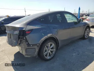 2024 Tesla Model Y Long Range z VIN 7SAYGDEE5RA244641, wystawiony jako Copart lot #51864845 z przebiegiem 23 096 mil mil oraz Szkoda całkowita • Salvage title. Historia ofert i sprzedaży dostępna na DreamBid. Obrazek 3.