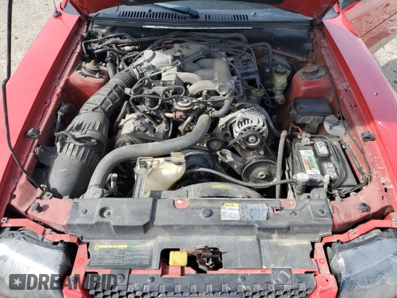 2003 Ford Mustang Deluxe z VIN 1FAFP44403F407589, wystawiony jako Copart lot #54002265 z przebiegiem 176 019 mil mil oraz Nie do naprawy • Non repairable. Historia ofert i sprzedaży dostępna na DreamBid. Obrazek 11.